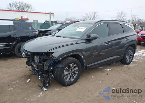 2022 Hyundai Tucson Hybrid Blue z USA, uszkodzony, nr VIN KM8JBCA10NU038377